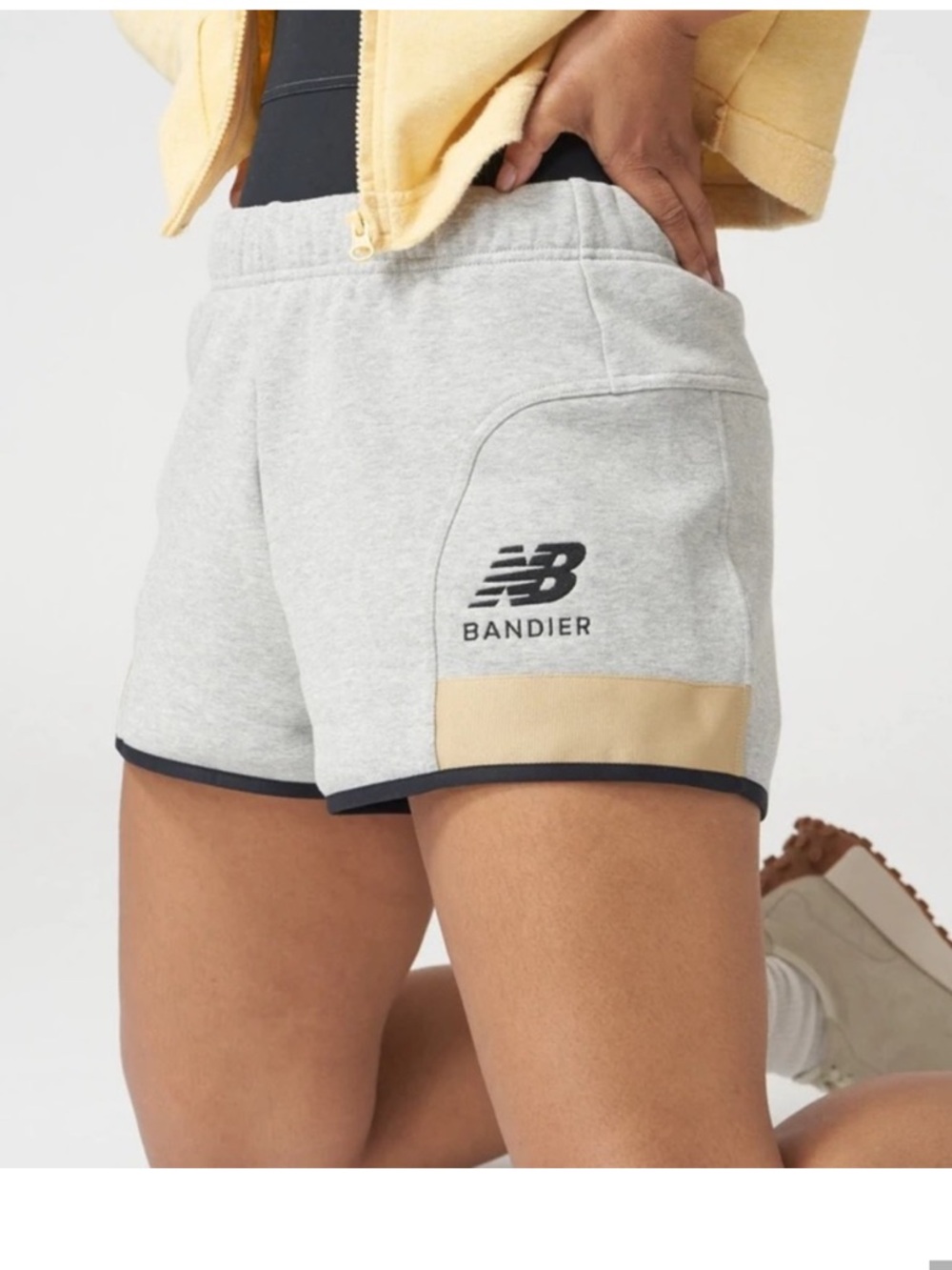 New Balance Women’s Light Gray Athletic Shorts with Beige Accent